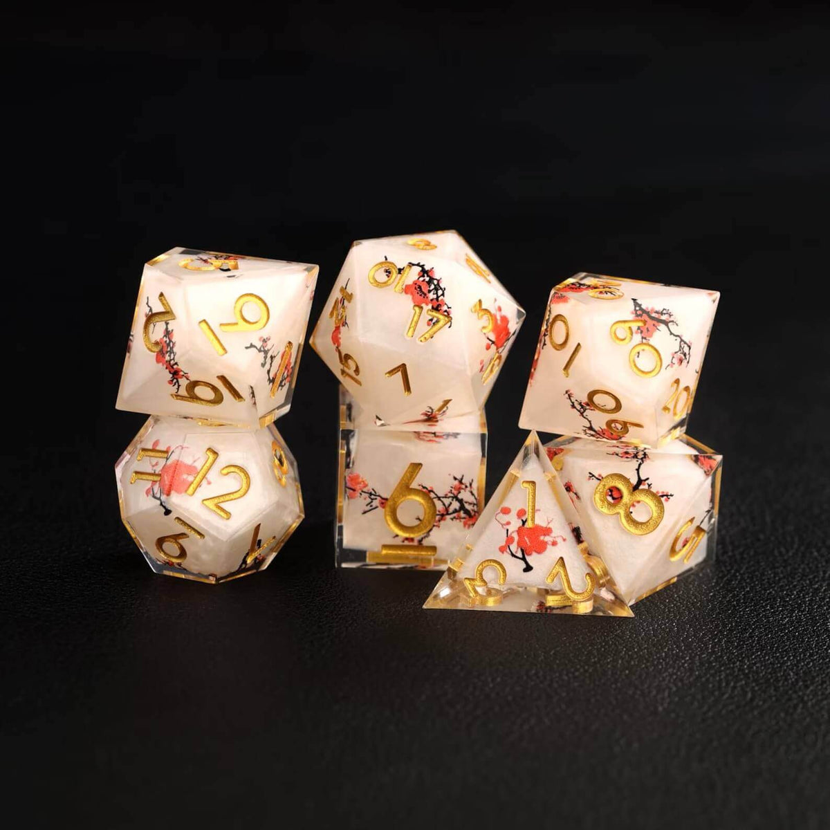 Close-up view of the intricate floral designs embedded in the Botanical Floral D&D Dice Set, highlighting the fine craftsmanship and resin quality.
