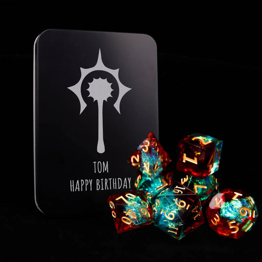 The complete URdice 7-piece engraved resin dice set presented inside a sleek, customizable metal storage box. Perfect for gift and collection.