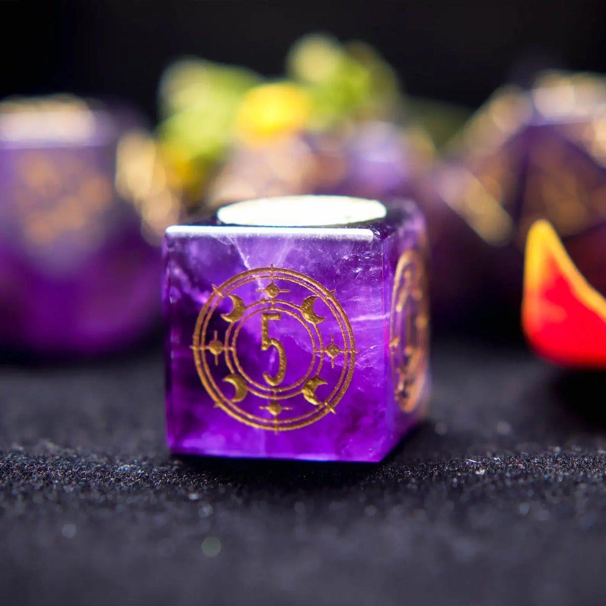 Lighting shot of the Purple Crystal DND Dice Set emphasizing the deep purple hue and light-reflective luster of the Amethyst.
