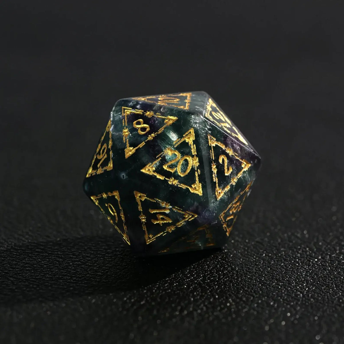 Single D20 from the Purple Fluorite DND Dice Set showcasing the clear number engraving and precision of the sharp edges.