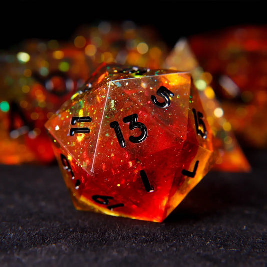 Close-up macro shot of the URdice holographic D20 die, highlighting sharp edges, black numerals, and intense orange-to-gold holographic glitter reflection.