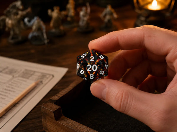 Black resin D20 dice with white numbers held above a wooden dice tray for a rogue or warlock character