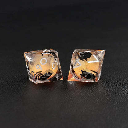 The mesmerizing swirling liquid core effect in the Orange Swirl Resin Set dice, with a cat animal dice accent.