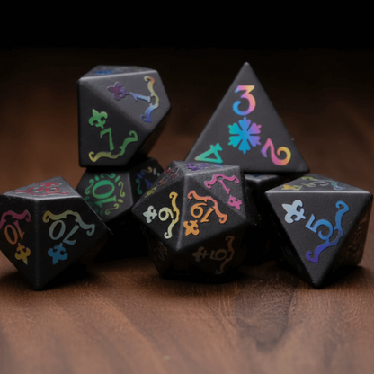 Seven Black Obsidian Crown Gemstone DND Dice Sets are neatly arranged on a dark walnut tabletop.