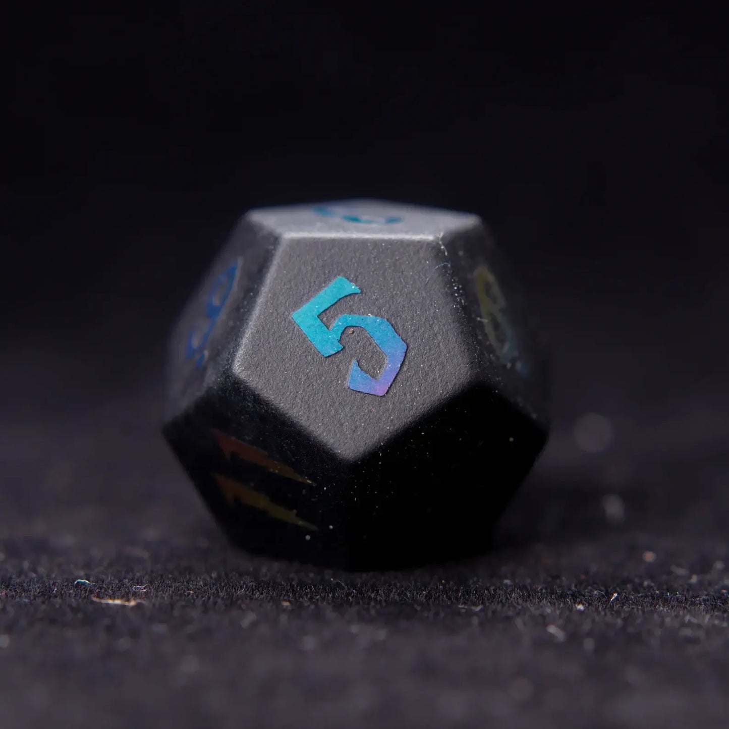 A polished Black Obsidian D12 Lightning die with intricate lightning patterns, perfect for adding precision and style to your tabletop RPG sessions.