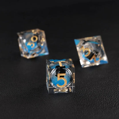 High-contrast shot emphasizing the deep blue swirling effect of the Liquid Core Dice Resin Set.