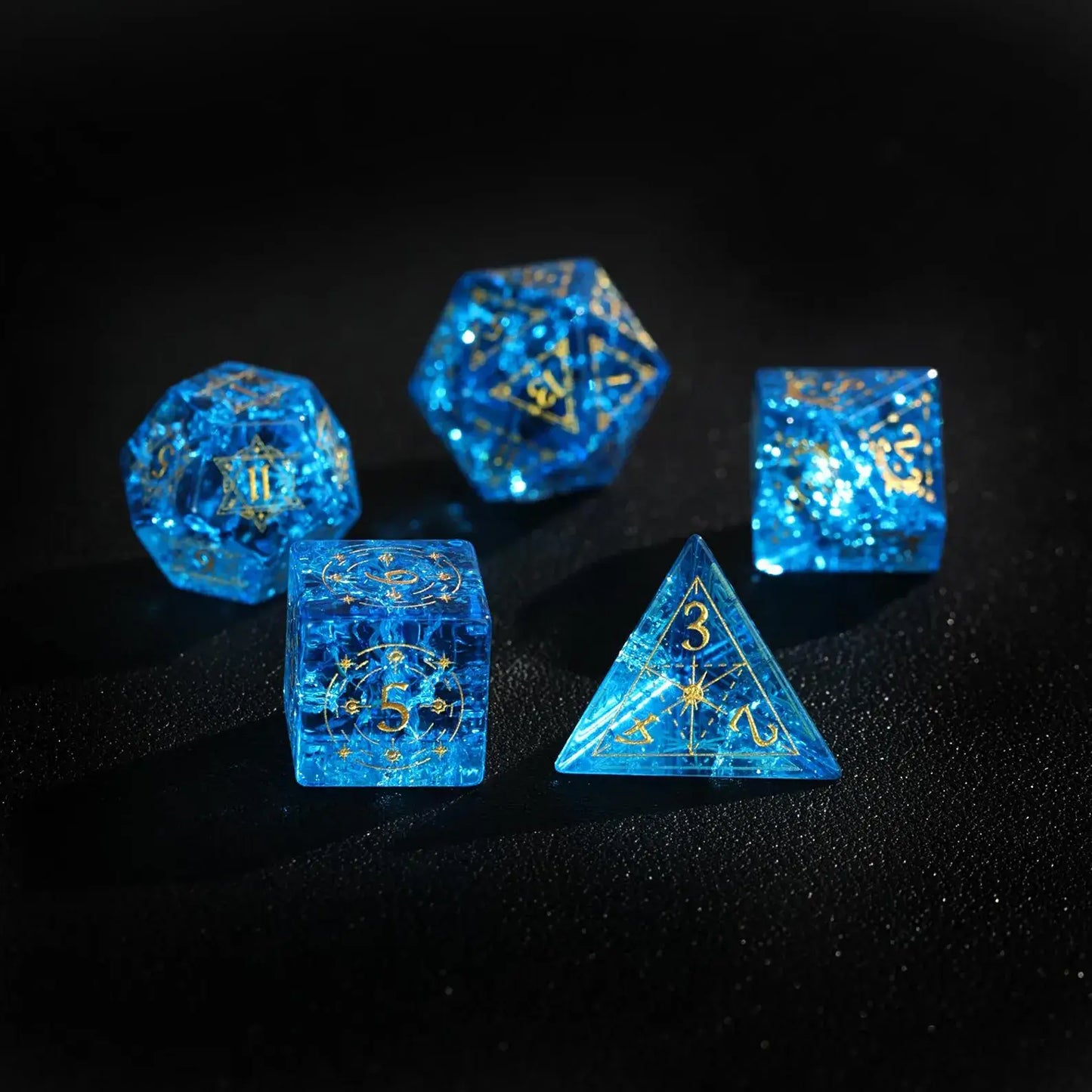 Macro view of the sharp point of the Blue Glass D4. Focus on the dangerous aesthetic of the sharp edge dice.