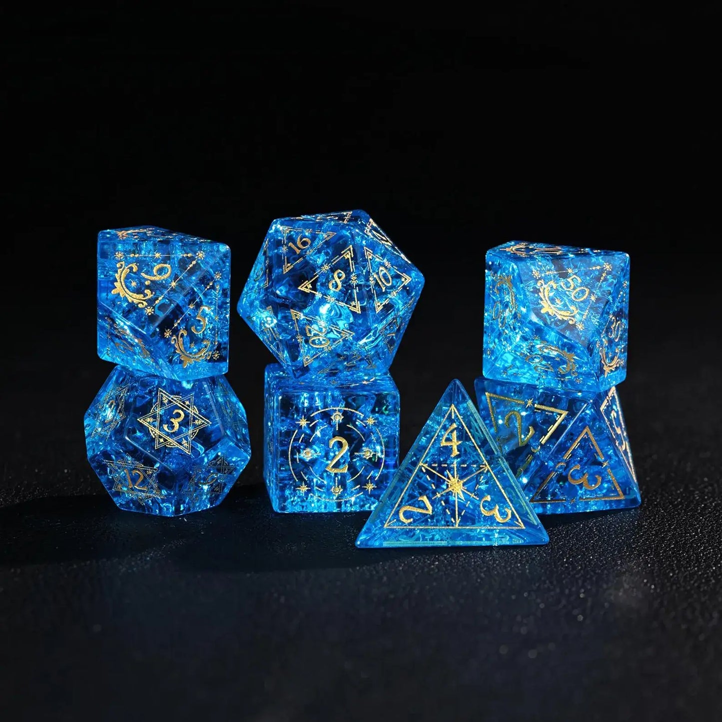 grouping (D20, D10, D6) of Blue Glass Sharp Dice on a black background. Perfect for displaying  options