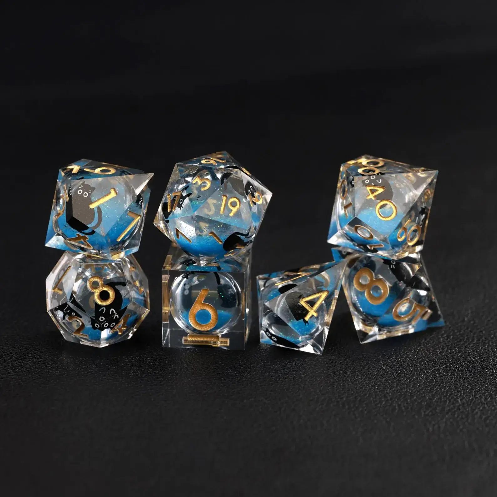 Full 7-piece Liquid Core Dice Resin Set in Blue Swirl pattern with black cat animal dice.