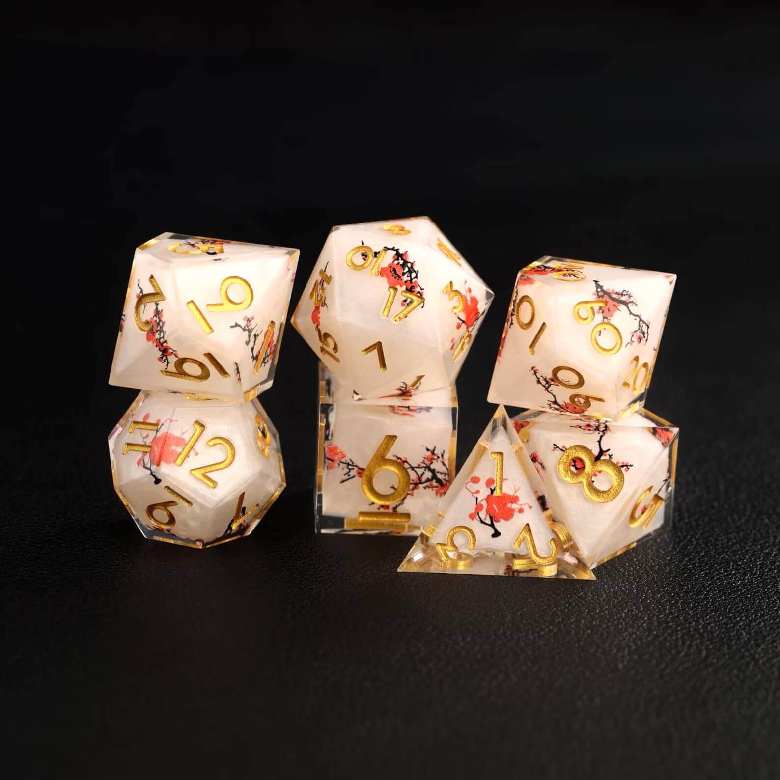 Close-up view of the intricate floral designs embedded in the Botanical Floral D&D Dice Set, highlighting the fine craftsmanship and resin quality.