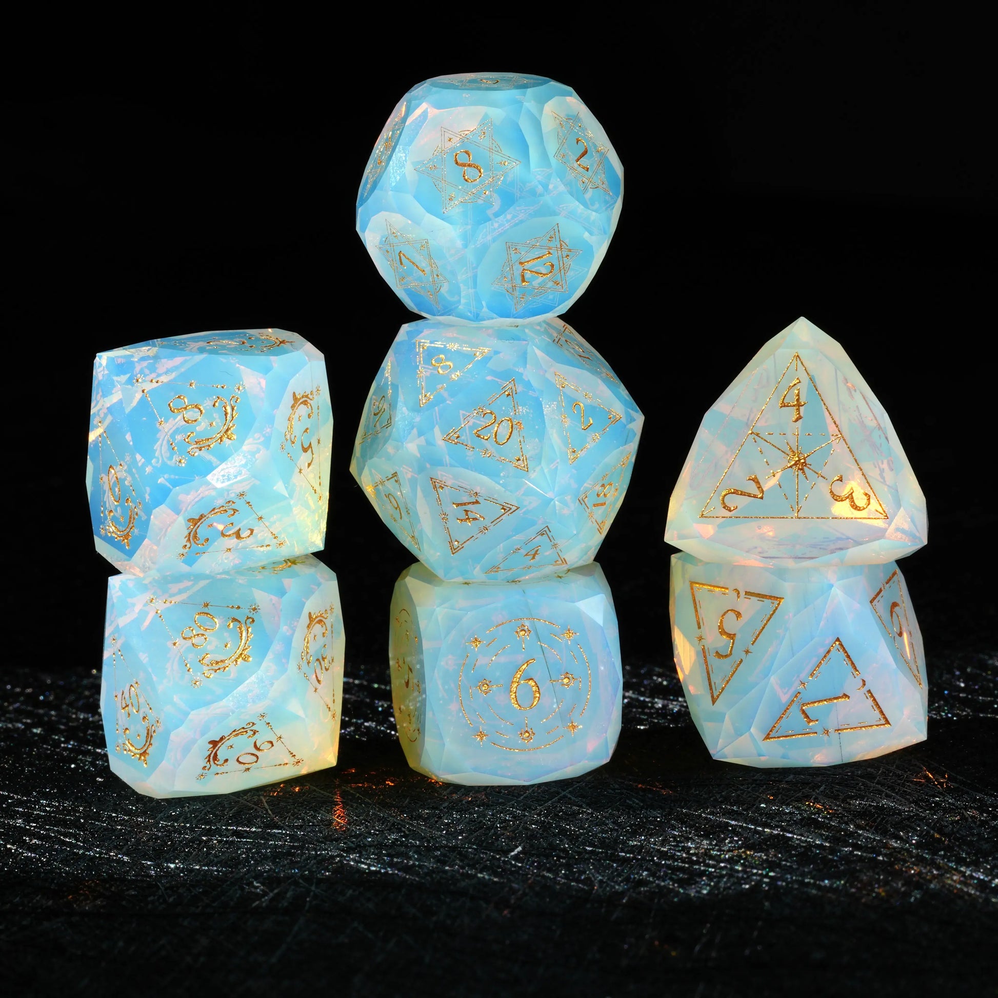 Complete seven-piece Sky Blue Opalite Glass Dice Set stacked for a DND tabletop RPG set