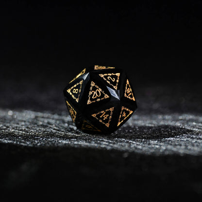 Celestial Black Obsidian Dice Set, single d20 on a dark tabletop background