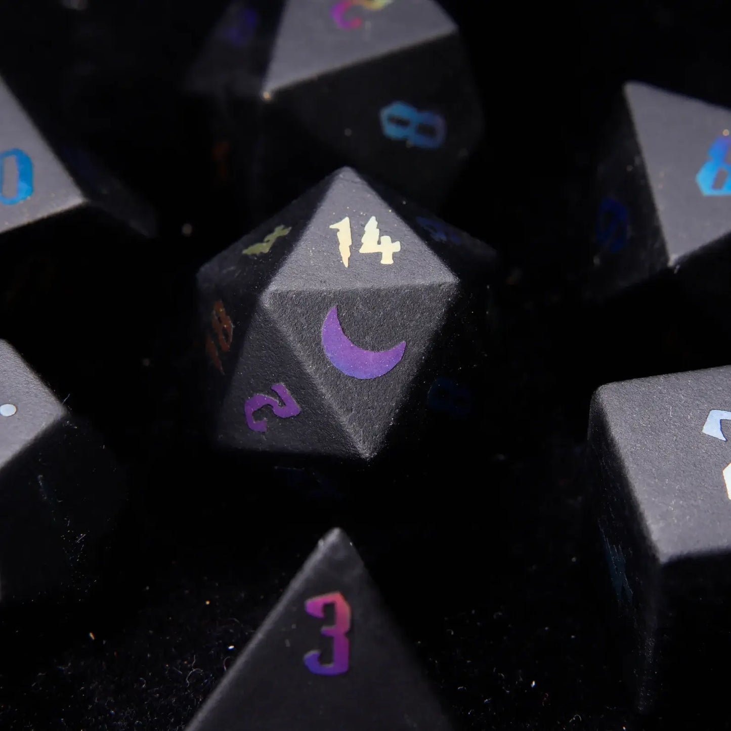 Close-up of the Black Obsidian D20 Lightning die, highlighting its unique lightning patterns and sharp edges for a superior rolling experience.