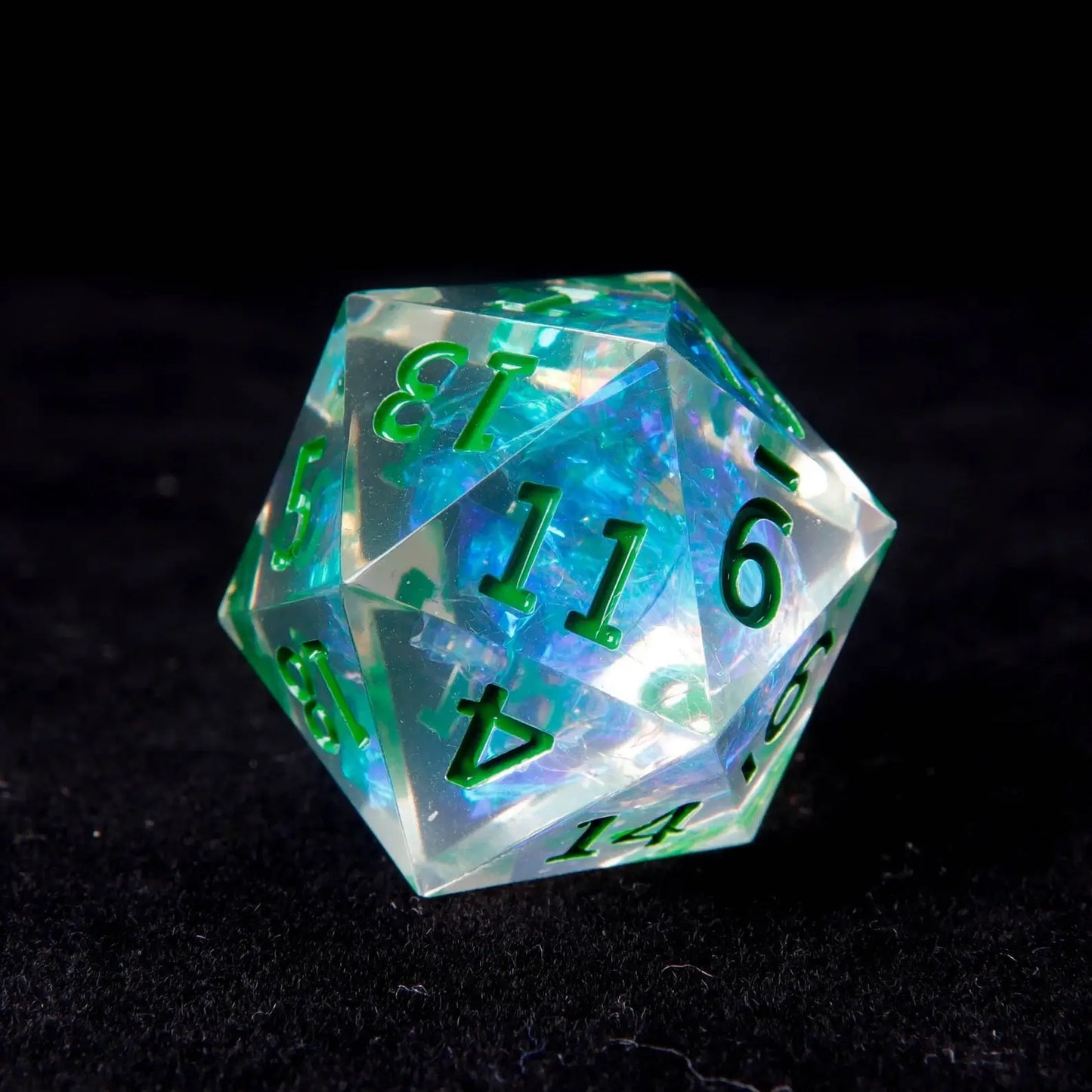 A close-up view of the Green Sharp Edge D20 die, highlighting its sharp edges and the deep green color for precision rolls.