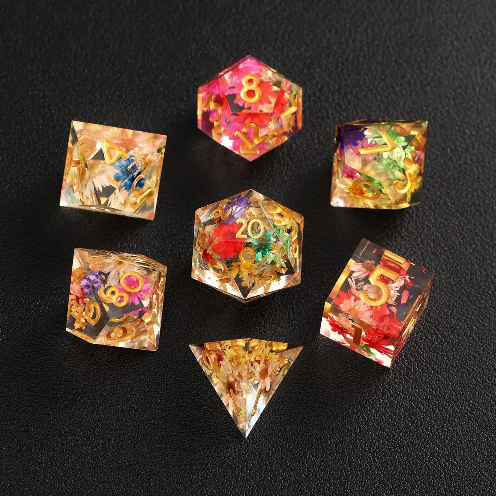 Full 7-piece Transparent Floral DND Resin Dice Set, including D4, D6, D8, D10, D%, D12, and D20, each with a beautiful, nature-inspired flower design.