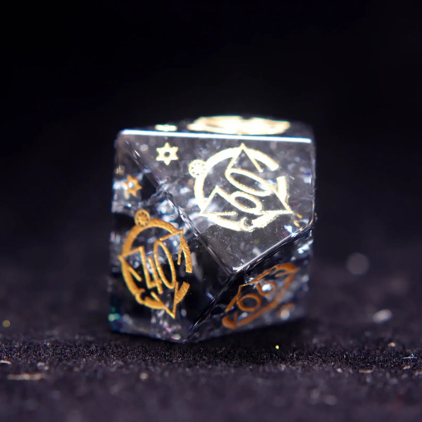 Individual Black Crystal D10 dice showcasing glossy finish and engraved numerals