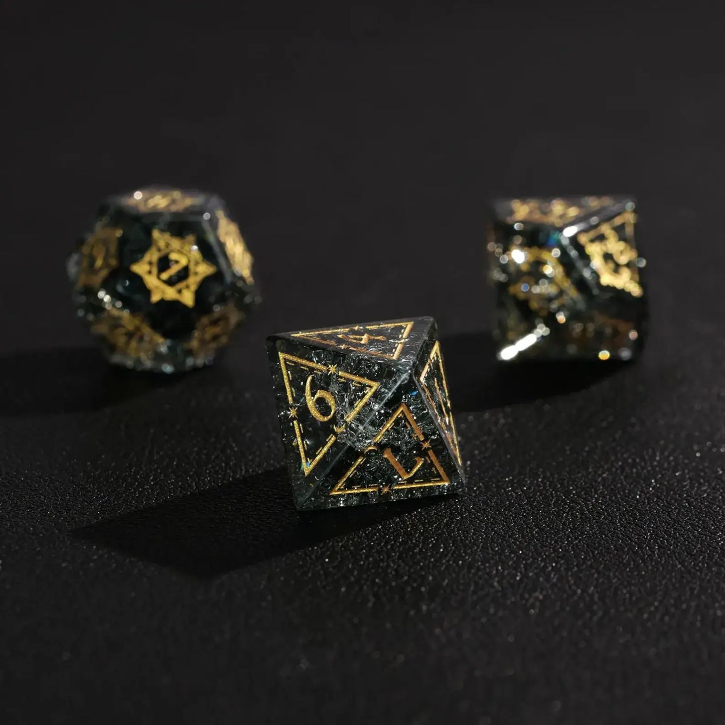 The full set of green glass dice placed atop a vintage-style fantasy map or role-playing game book, creating an adventure-themed scene.