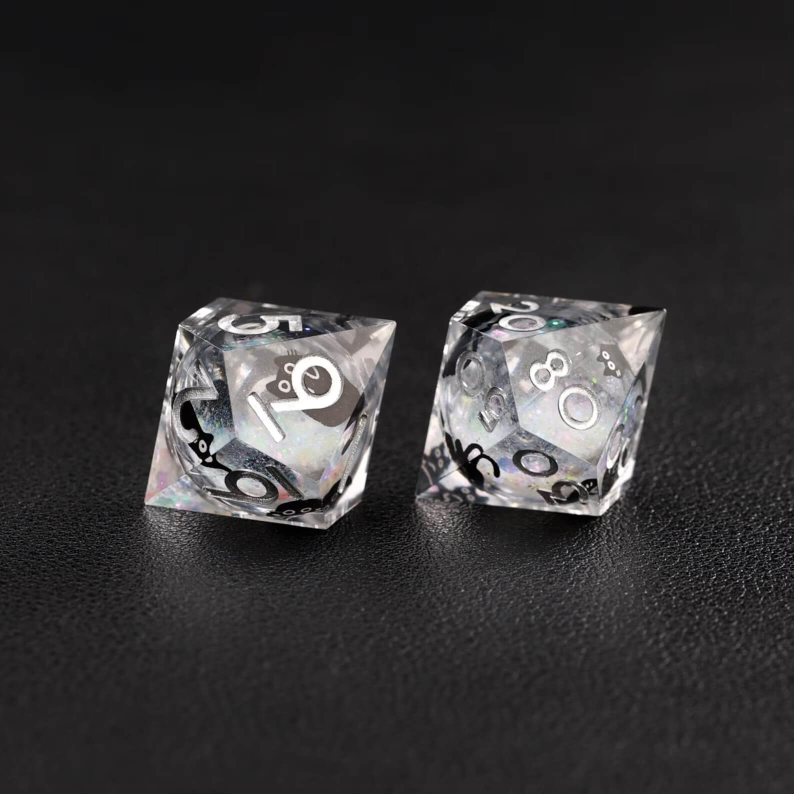 High-contrast photo emphasizing the metallic silver swirl effect of the Liquid Core Dice Resin Set.
