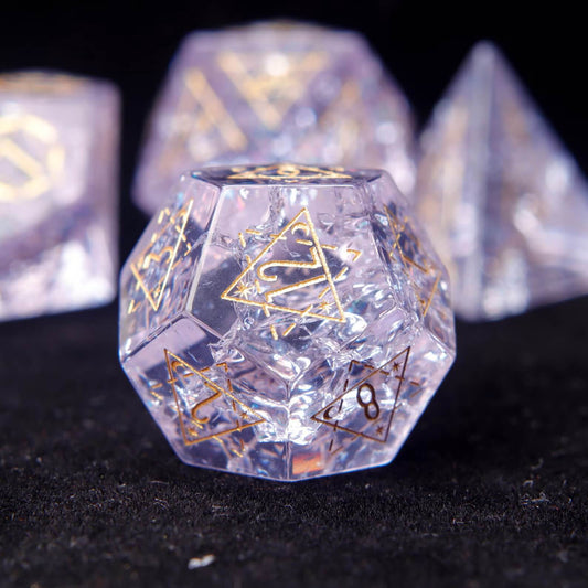 Pink Glass Sharp Edge RPG Dice Set scattered across a pure black background. Shows the luxury finish and light reflection of the dice.