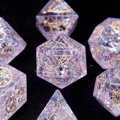 Full polyhedral set of Pink Glass Sharp Edge DND Dice on a black background. Highlighting the gold numbers and crystal clarity.