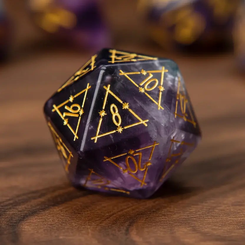 Single, beautifully engraved purple fluorite D20 die isolated on a walnut wood table background.
