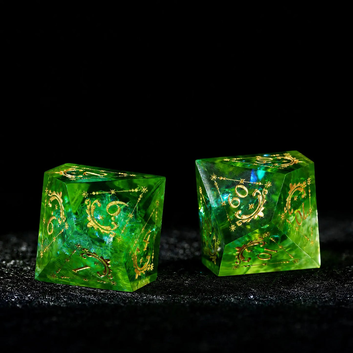 Emerald Cosmic Foil Sharp Edge Resin Dice Set, two dice stacked to show transparent color and gold engraving