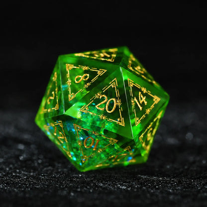 Emerald Cosmic Foil Sharp Edge Resin Dice Set, close-up of the d20 with sharp edges and gold numbers