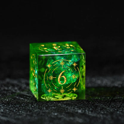 Emerald Cosmic Foil Sharp Edge Resin Dice Set, close-up of the d6 with gold celestial numbers