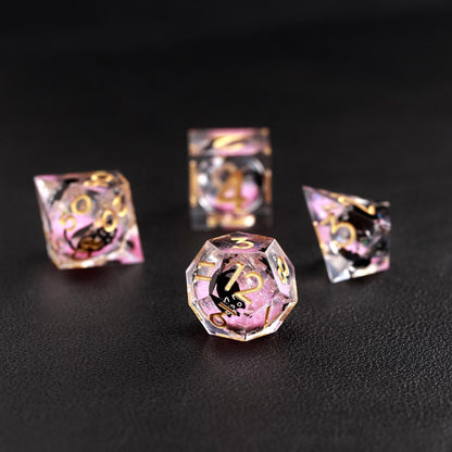 High-contrast photo emphasizing the vibrant and sweet pink swirl effect of the Liquid Core Dice Resin Set