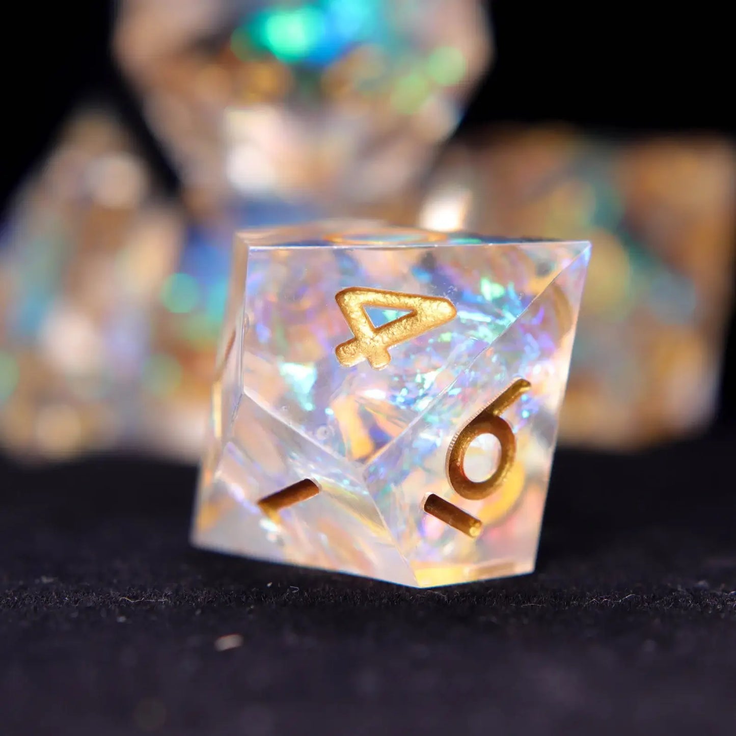 Single rainbow transparent resin D8 reflecting light with clean aesthetic and gold numbers for tabletop RPGs