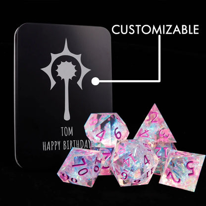 Pink and purple resin dice set stored in metal tin, ideal DND dice gift for girls and tabletop gamers