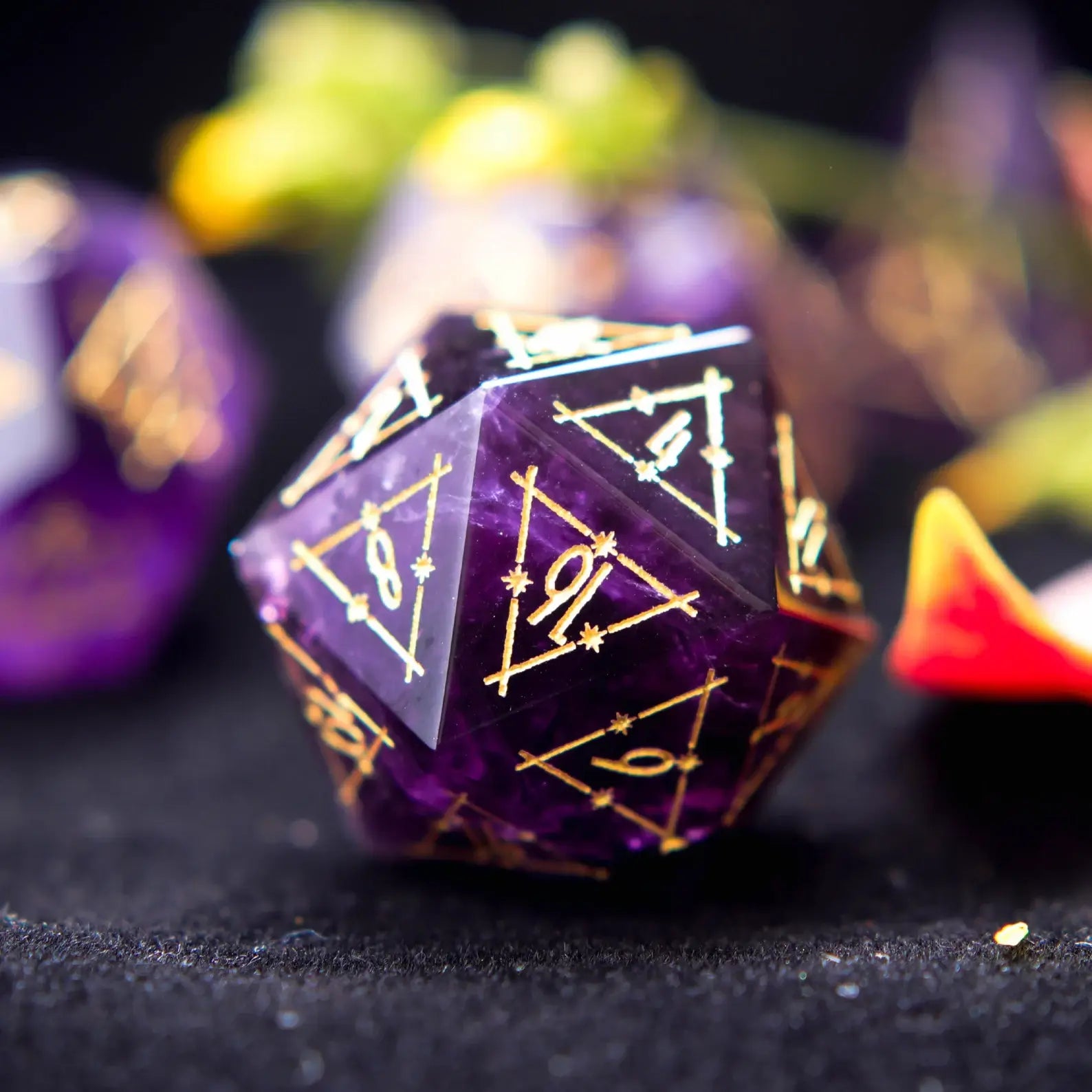 Close-up of the D20 from the Purple Crystal DND Dice Set highlighting the internal Amethyst crystal facets and engraved numbers.