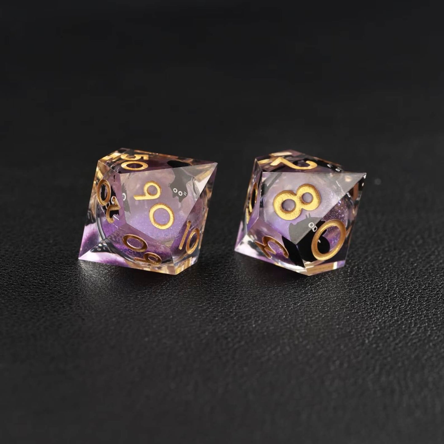 Black cat themed Liquid Core Dice made from purple swirl resin, animal dice set designed for tabletop RPG players