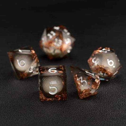 Black Copper Foil Liquid Core DND Resin Dice full set displayed with RPG miniatures and character sheets