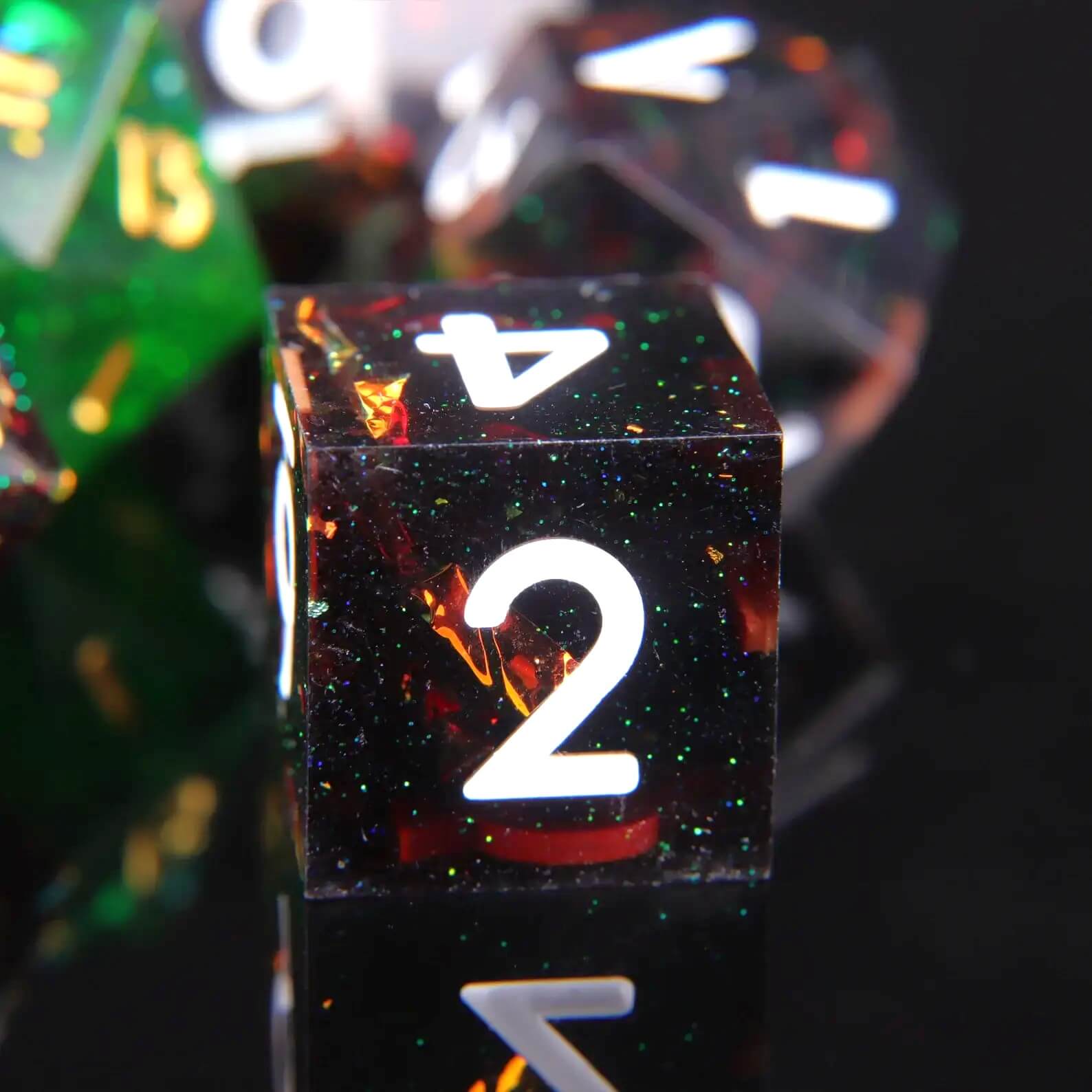 Black Ember D6 dice, sharp-edged polyhedral resin with glowing ember effect