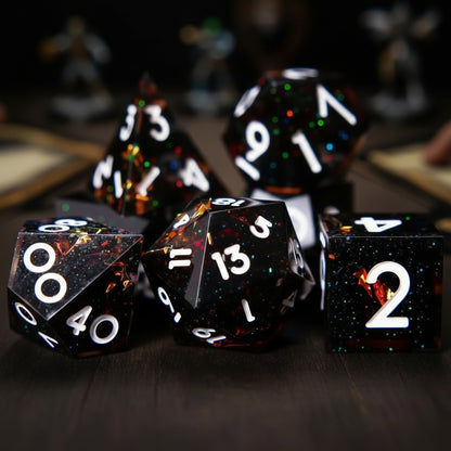 Complete Black Ember Resin Dice Set including D4, D6, D8, D10, D12, D20 arranged neatly