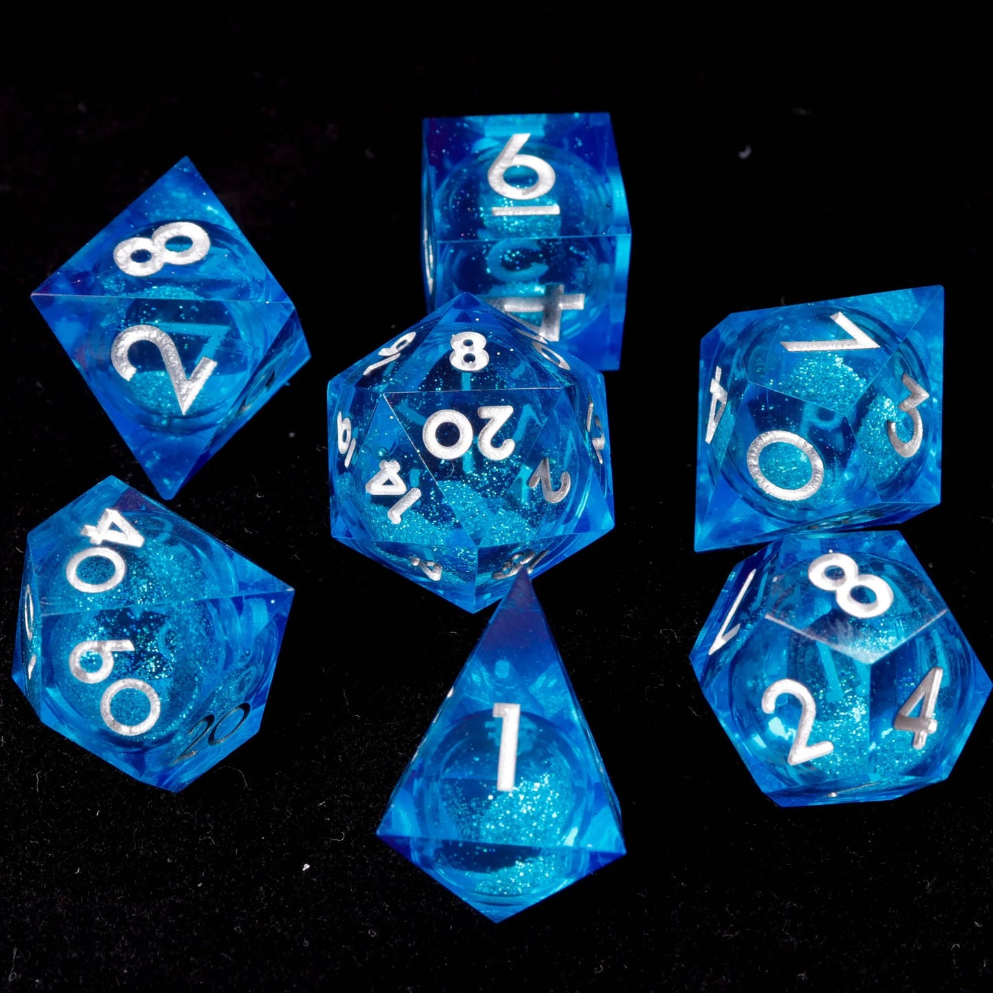 Shaking Blue Starry Liquid Core Dice showing swirling glitter and galaxy liquid core for D&D