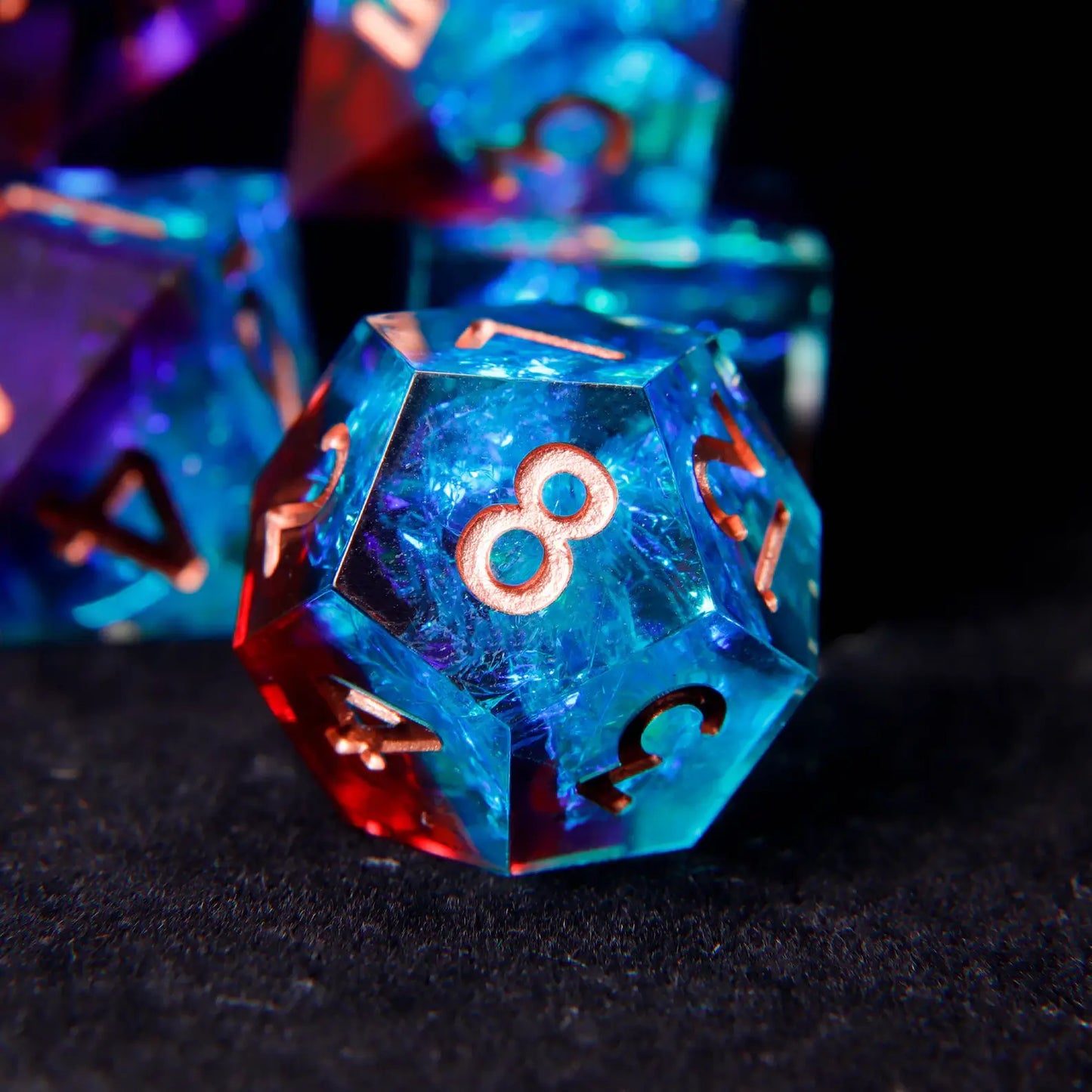 D12 die featuring a vibrant laser iridescent finish that shifts from blue to red, paired with luxurious rose gold numbering.