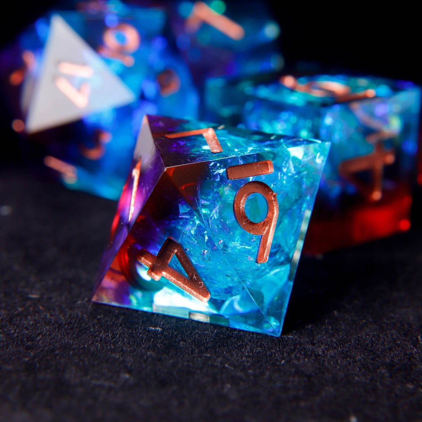 Eight-sided D8 die displaying a dynamic laser iridescent surface and finely engraved rose gold numerals.