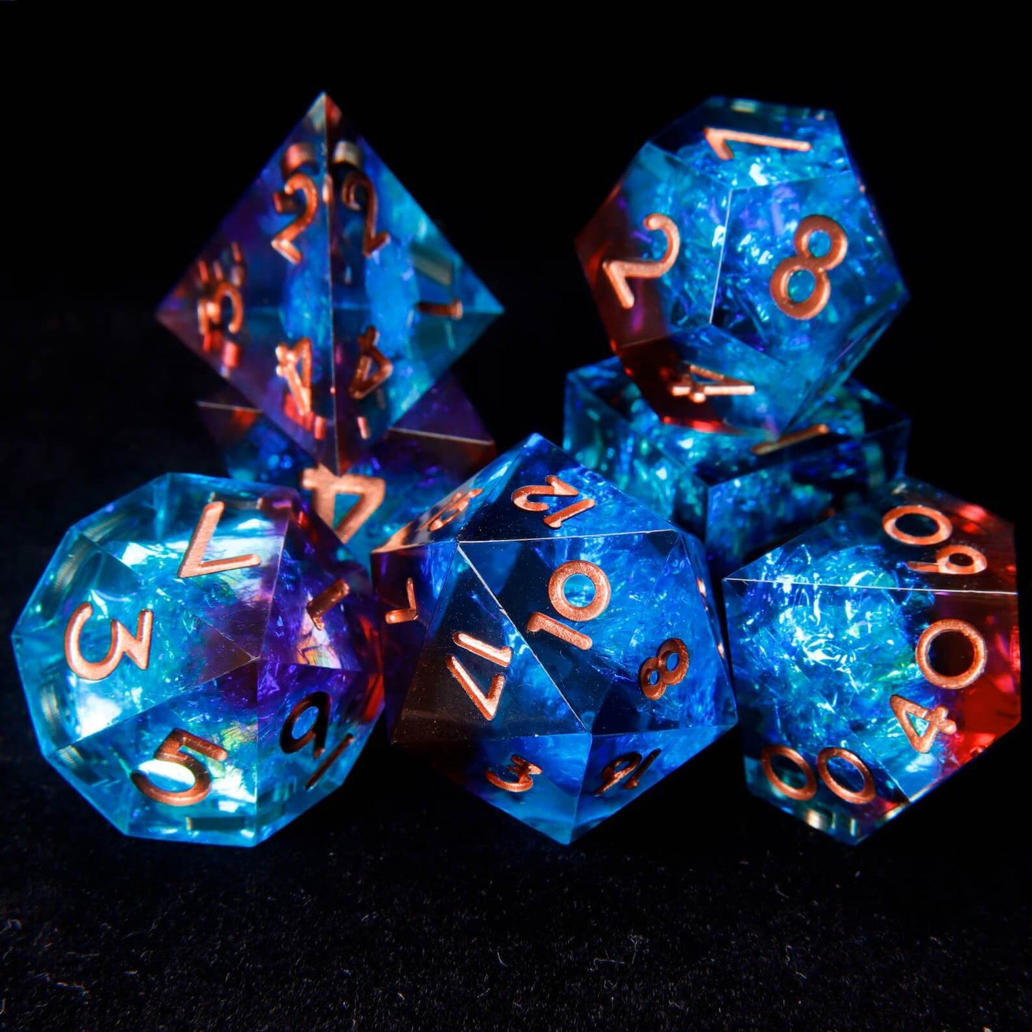 Artistic pile of blue-red laser iridescent dice with rose gold numbers, casually scattered to highlight their shimmering, multidimensional colors.