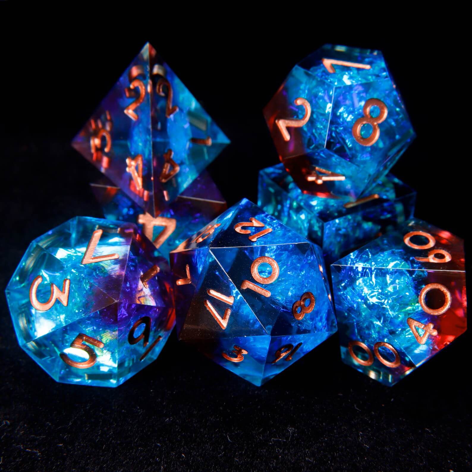 Artistic pile of blue-red laser iridescent dice with rose gold numbers, casually scattered to highlight their shimmering, multidimensional colors.