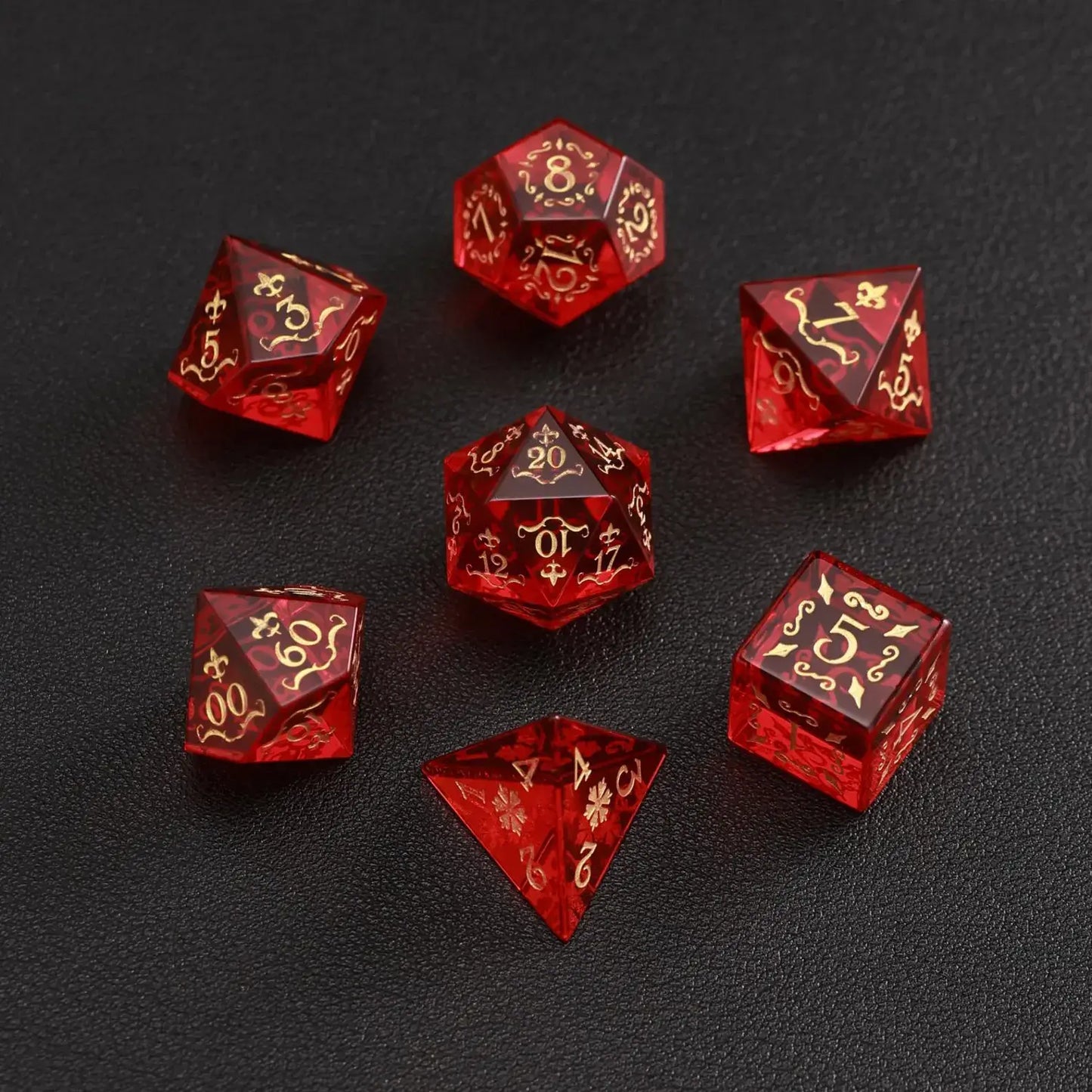Collector-grade Red Garnet D20 with dramatic lighting on a pure black background, highlighting its luxury status.
