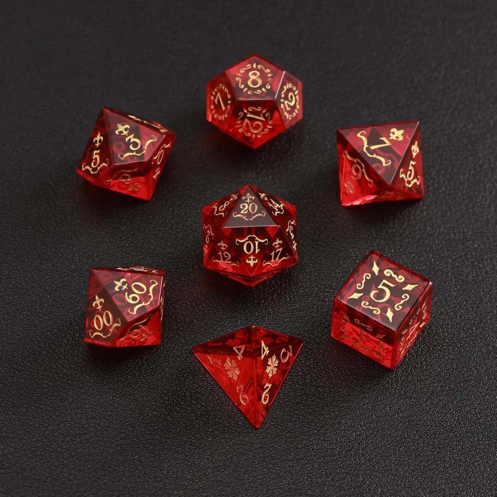 Collector-grade Red Garnet D20 with dramatic lighting on a pure black background, highlighting its luxury status.