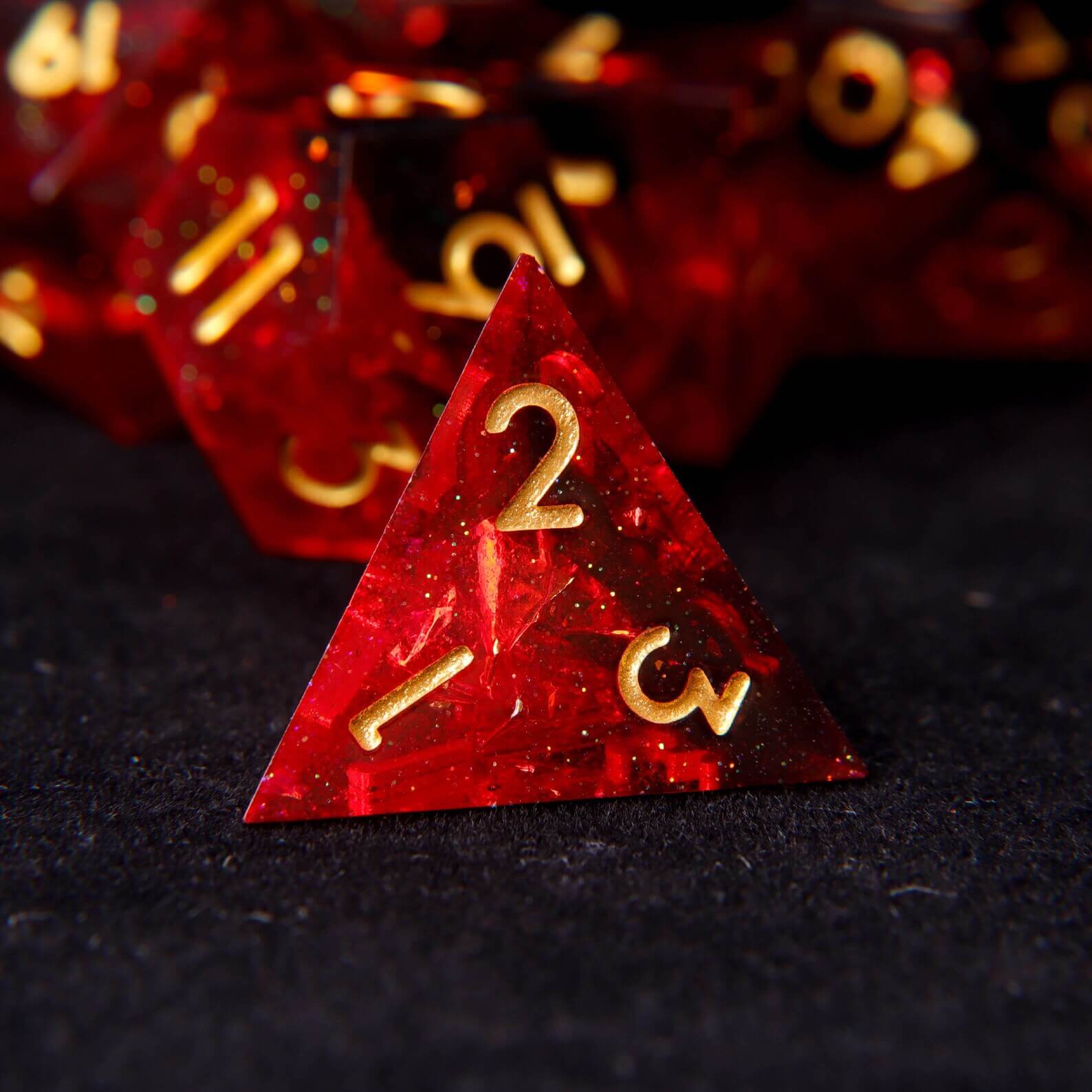 The fiery red sharp edge dice set arranged on a fantasy tabletop RPG battle map, ready for a D&D session.