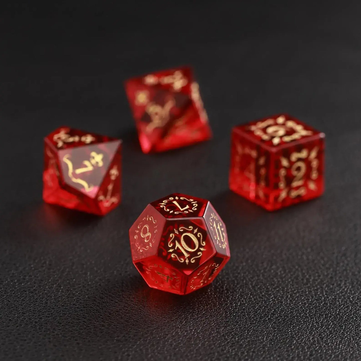 Red Garnet D12 RPG dice focused on the unique facets and rich deep color, perfect for Dungeons & Dragons campaigns.