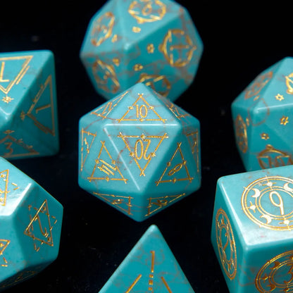 Close-up macro shot of a single engraved Green Howlite D20 die from URDICE.