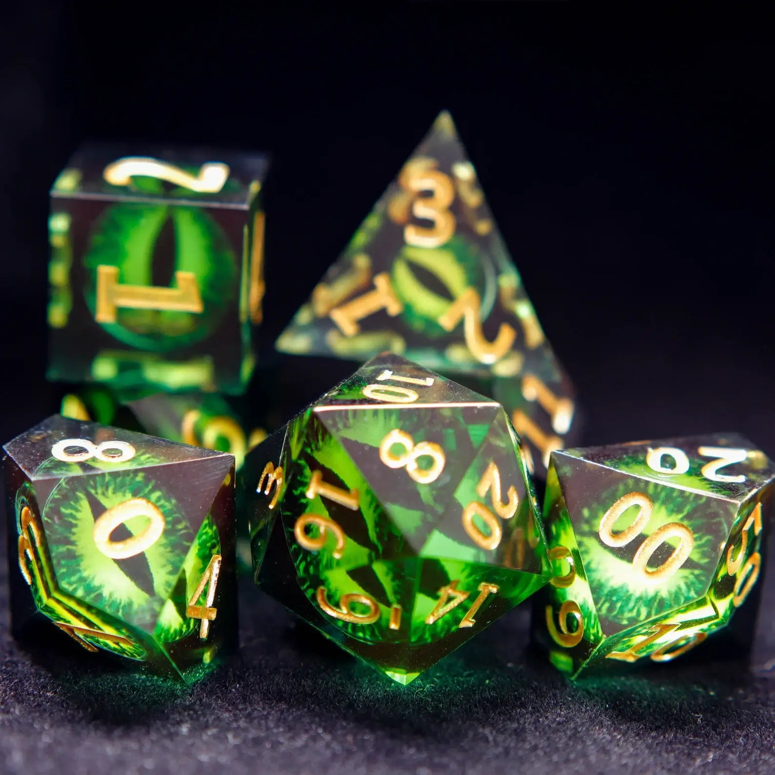 Complete Green Resin Demon's Eye Dice Set - all seven polyhedral dice displayed together.