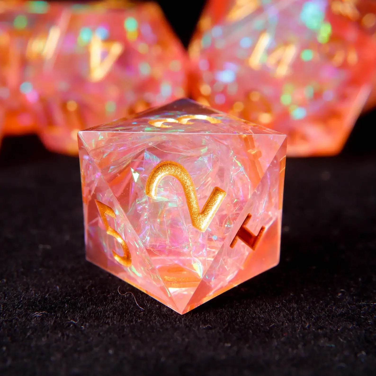 Handcrafted sharp edge D&D dice set with vibrant holographic orange tones