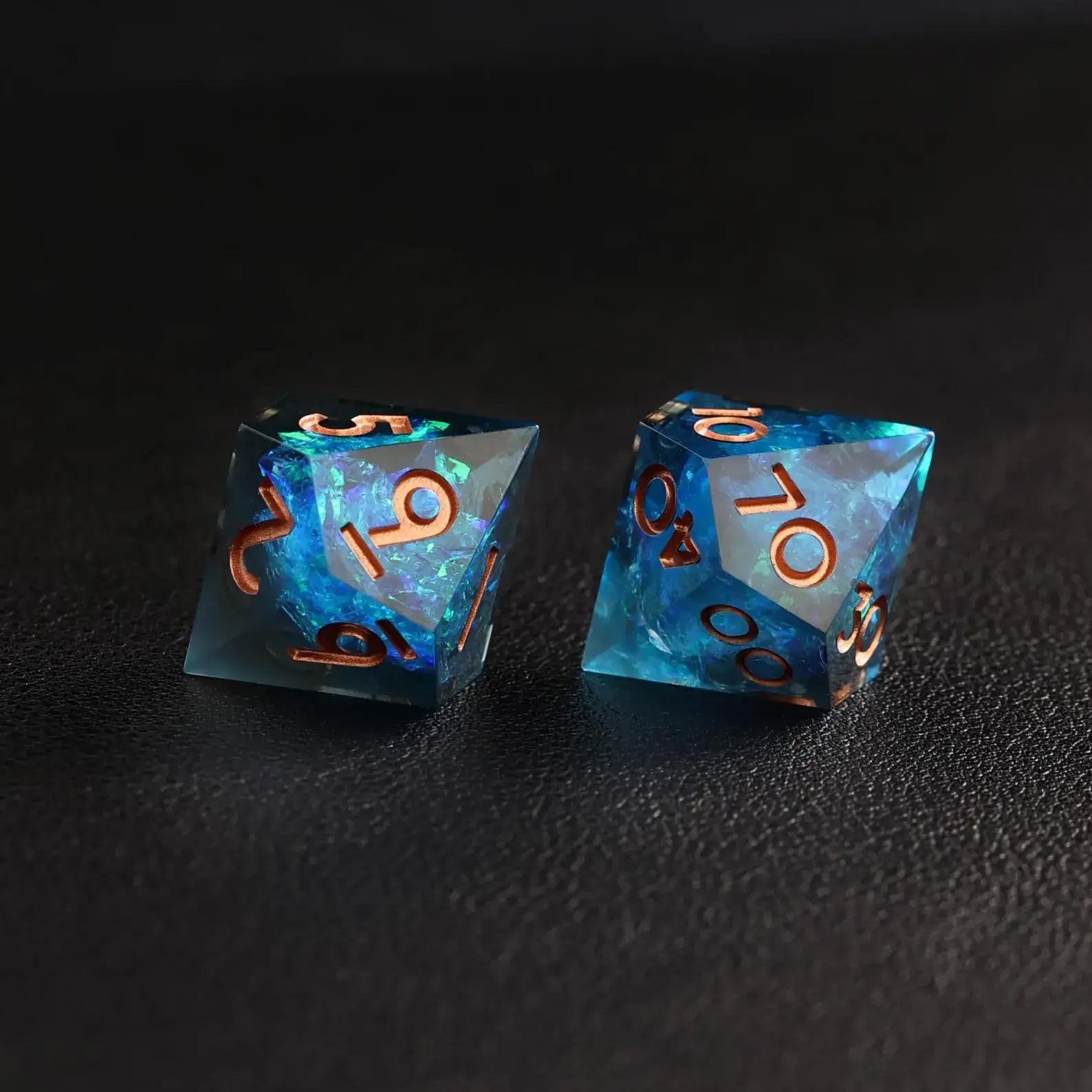 Macro shot of the Blue Lightning D6 showing the unique swirling pattern of the sharp edge resin dice.