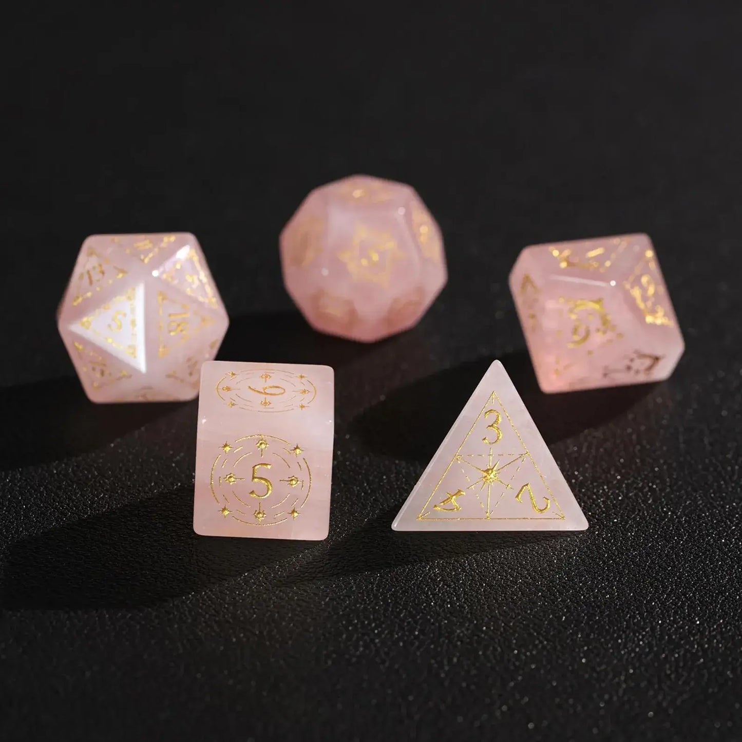 Key polyhedral set (D20, D12, D10) from the Pink Crystal collection displayed together on black.